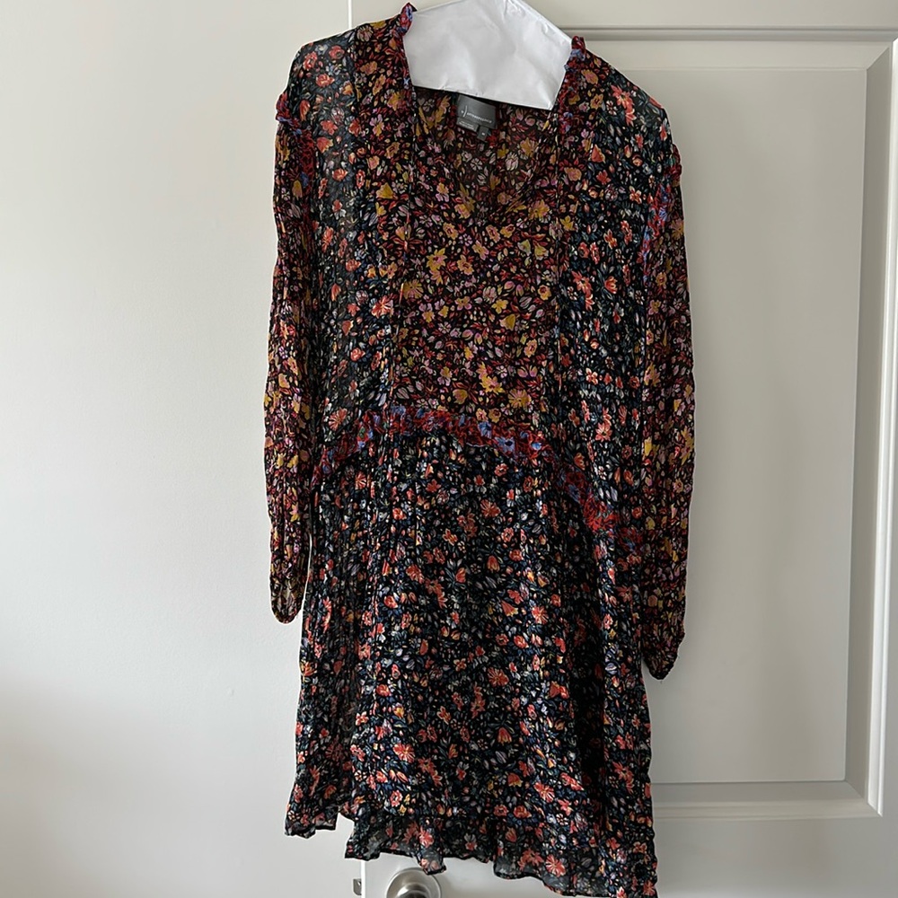 Such a fun dress! Size XS